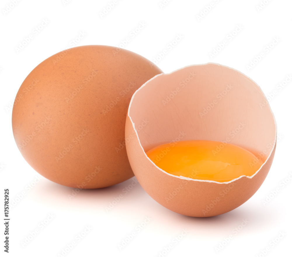 Broken egg in eggshell half and raw egg isolated on white background cutout Broken egg in eggshell half and raw egg isolated on white background cutout