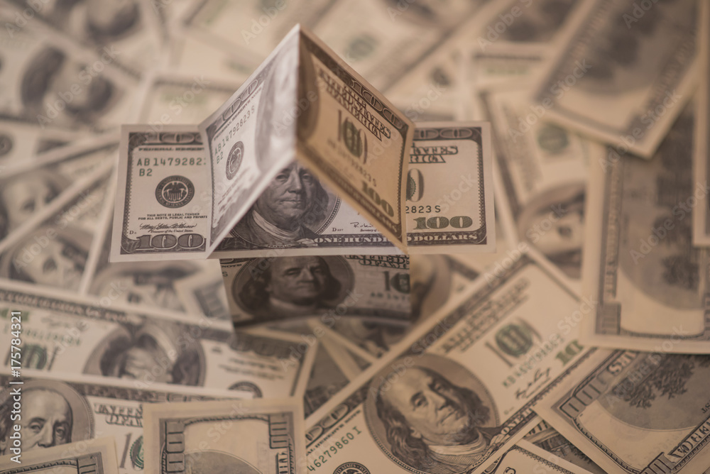 US dollar banknotes on display in the shape of a house on the expansion of the money US dollar banknotes on display in the shape of a house on the expansion of the money