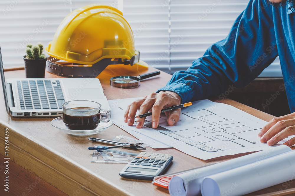Architect man drawing on architectural project. Architect man drawing on architectural project.