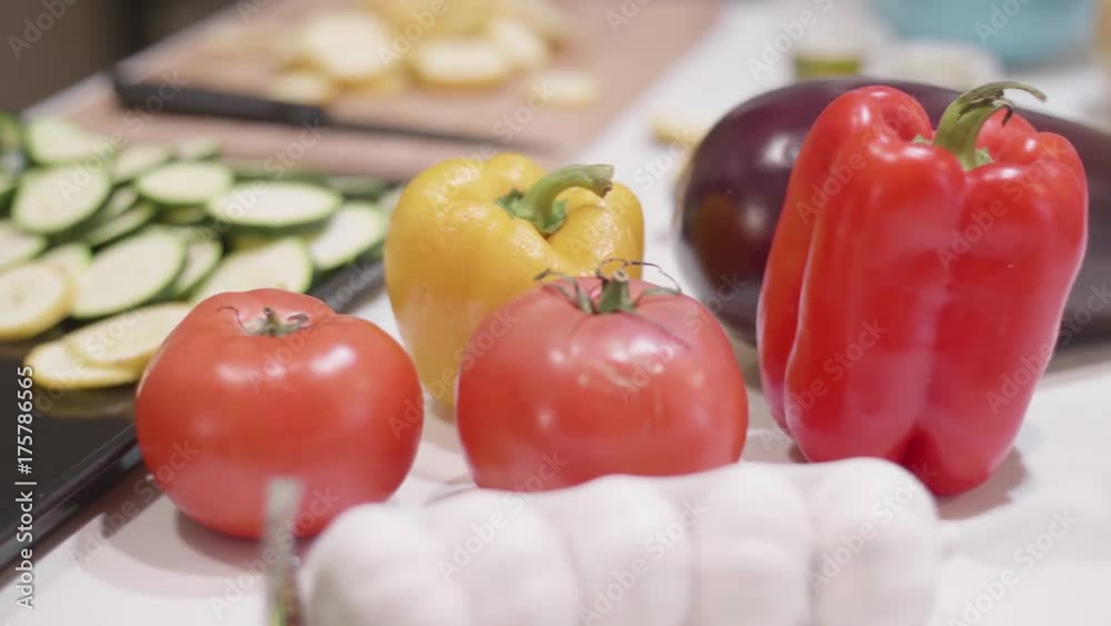 Organizing vegetables on a counter in a kitchen Organizing vegetables on a counter in a kitchen