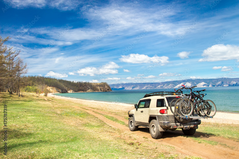 Off-road car on the sea coast