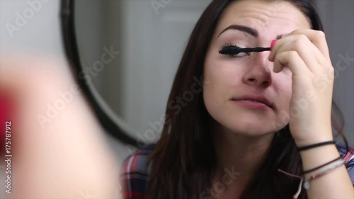 Young Woman Applies Mascara
