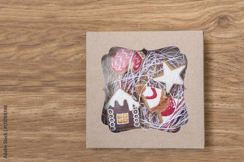 Christmas gingerbread cookies in a gift box on a wooden background