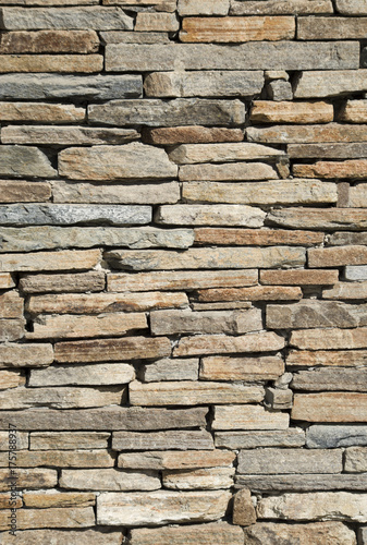 Old colorful stone wall closeup