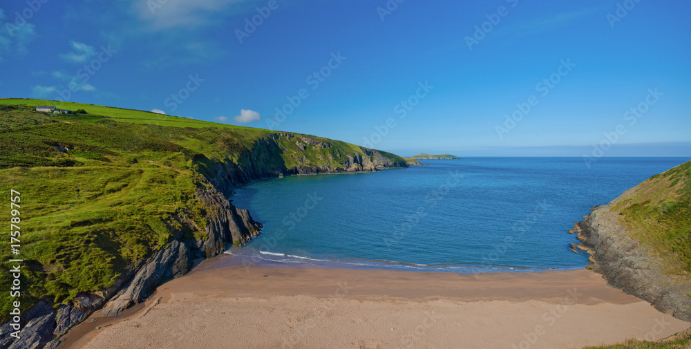 Secluded sandy beach at Mwnt Cove near Cardigan, Wales, UK