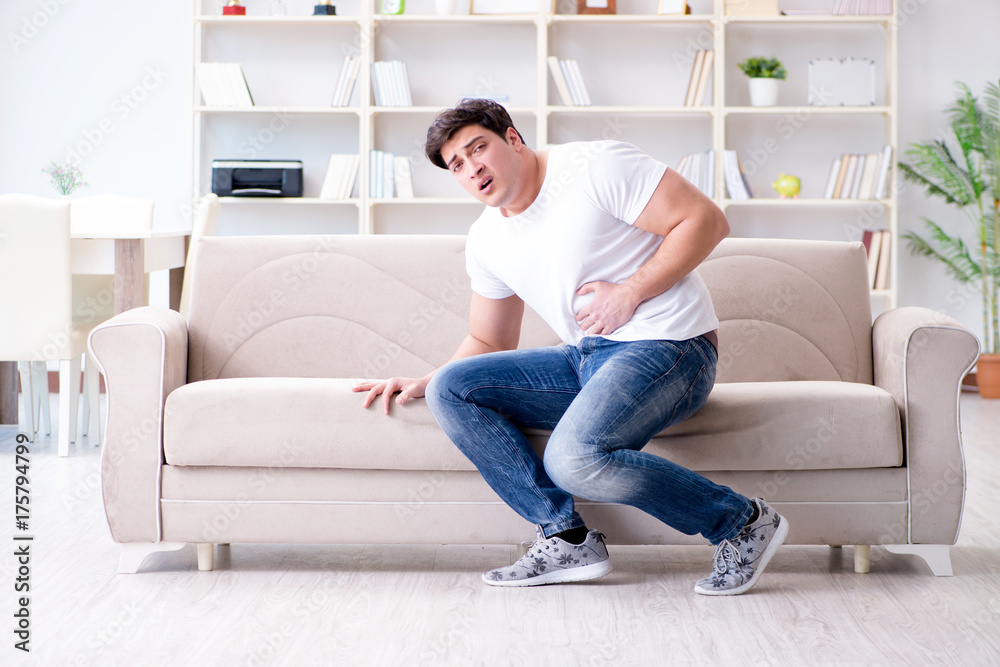 Man suffering from sick stomach and vomiting Man suffering from sick stomach and vomiting