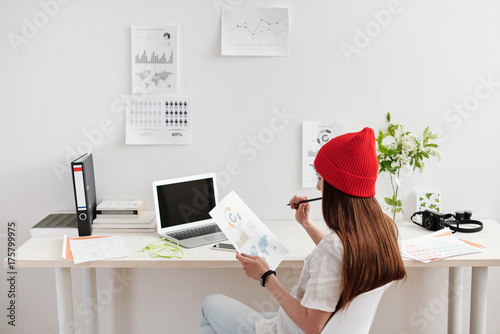 Freelancer woman working at the desk photo