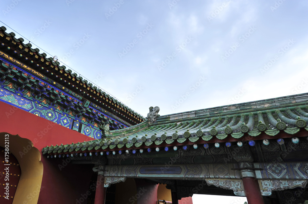 The ancient wall, blue glazed tile roof, located in the temple of heaven in Beijing, in China The ancient wall, blue glazed tile roof, located in the temple of heaven in Beijing, in China