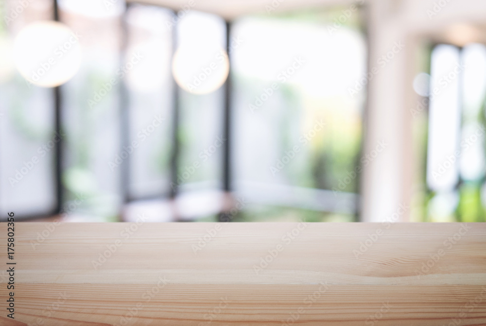Empty wooden table and blur background of abstract in front of restaurant or coffee shop, cafe  can be used Mock up for display of product or for montage