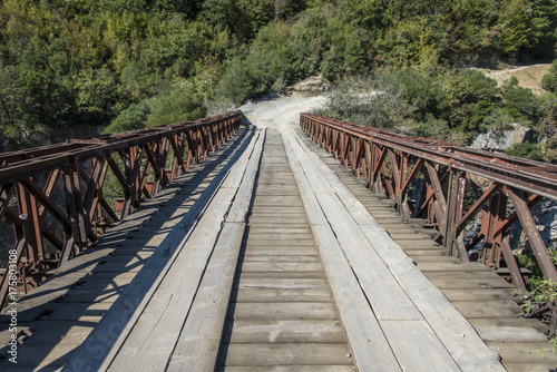 Fototapeta Naklejka Na Ścianę i Meble -  Old metal bridge over Osumi canyon, Albania