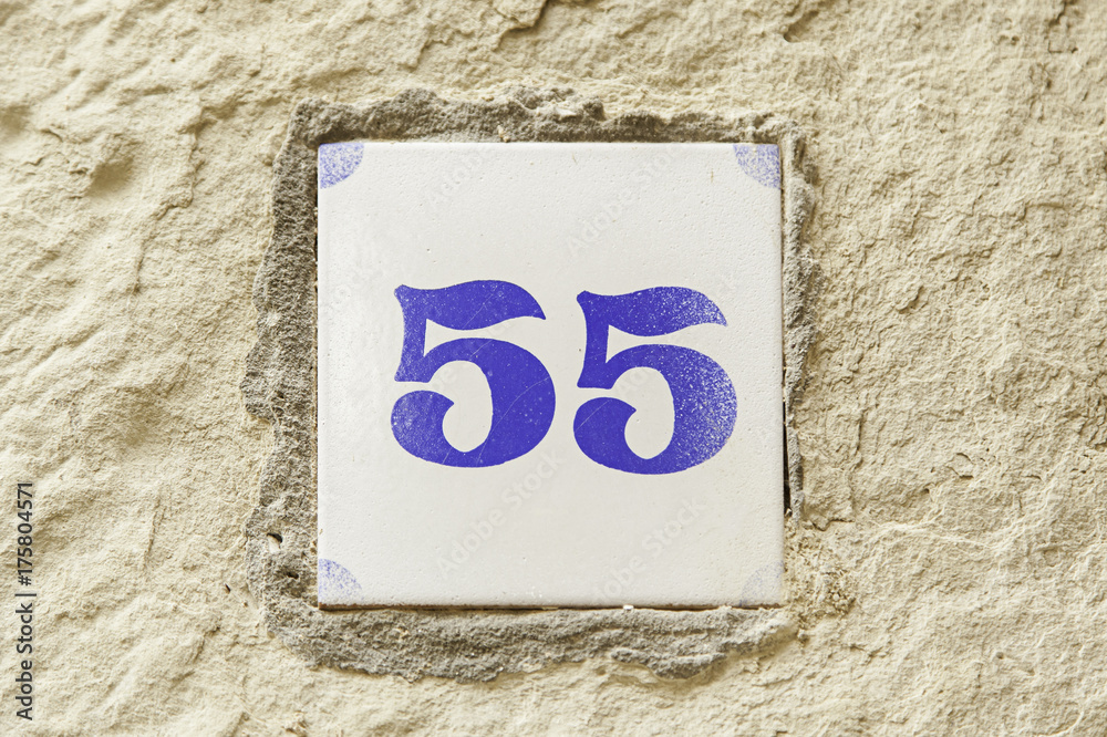 Number fifty-five of information on a wall Number fifty-five of information on a wall
