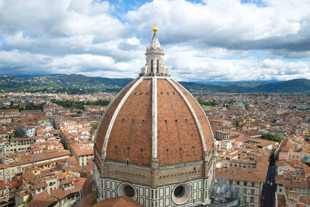 Dome of the ancient cathedral of Santa Maria del Fiore over Florence on a cloudy September day. Italy