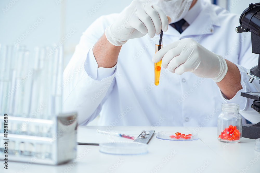 Doctor testing patients urine for medical purposes Doctor testing patients urine for medical purposes