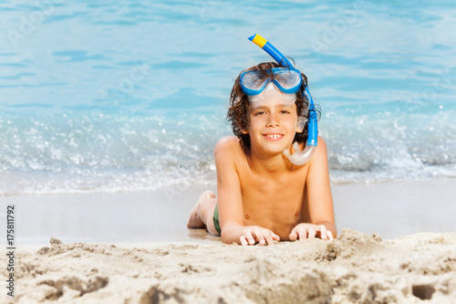 Boy in scuba mask on summer sea vacation