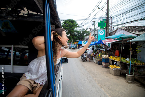 the girl in the taxi tuk-Tuk photo