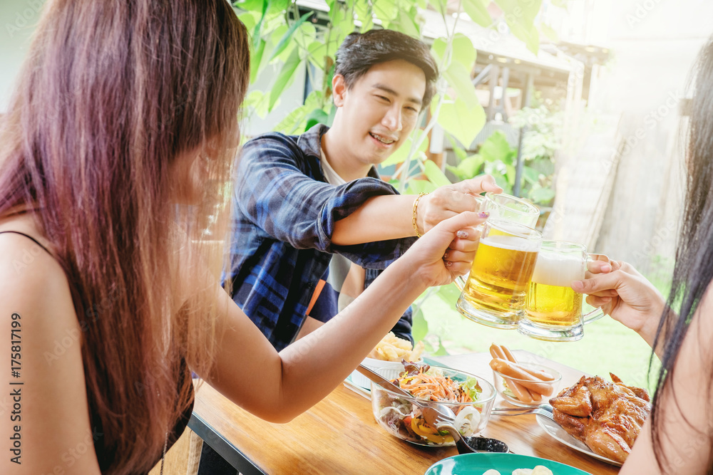 Group of young asian people celebrating beer festivals happy while enjoying home party Group of young asian people celebrating beer festivals happy while enjoying home party