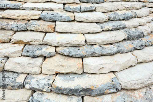 Trulli house stony roof in Alberobello, Italy