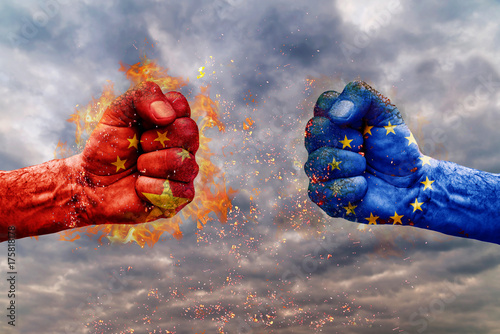 Two fist with the flag of China and EU faced at each other ready for fight photo