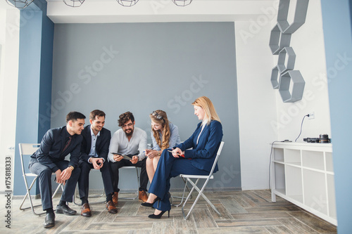 young business people group have meeting and working in modern bright office photo