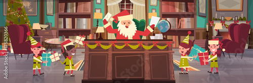 Santa Claus Working With Elfs In Office Room Getting Merry Christmas And Happy New Year Gifts And Presents, Winter Holidays Concept Flat Vector Illustration