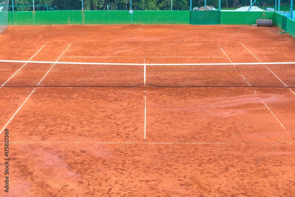 Large clay tennis court without people