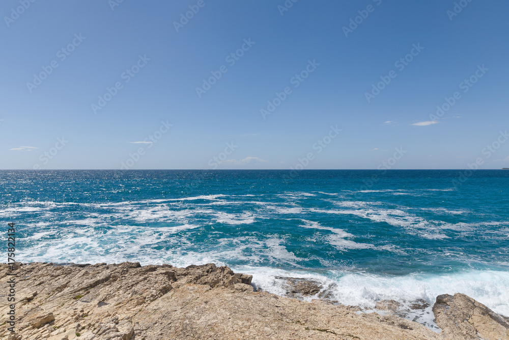 Rocky shore of the Adriatic sea after storm Rocky shore of the Adriatic sea after storm