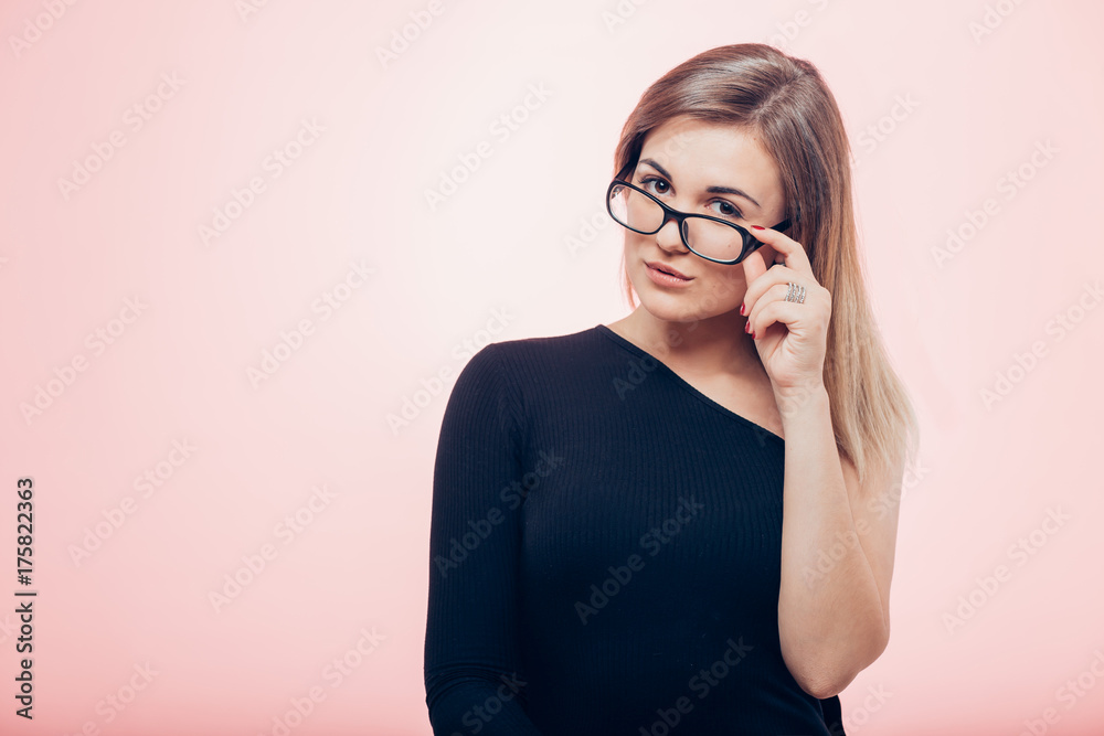 Smiling Young Business Woman Wearing Eye Glasses Looking at the Camera Smiling Young Business Woman Wearing Eye Glasses Looking at the Camera