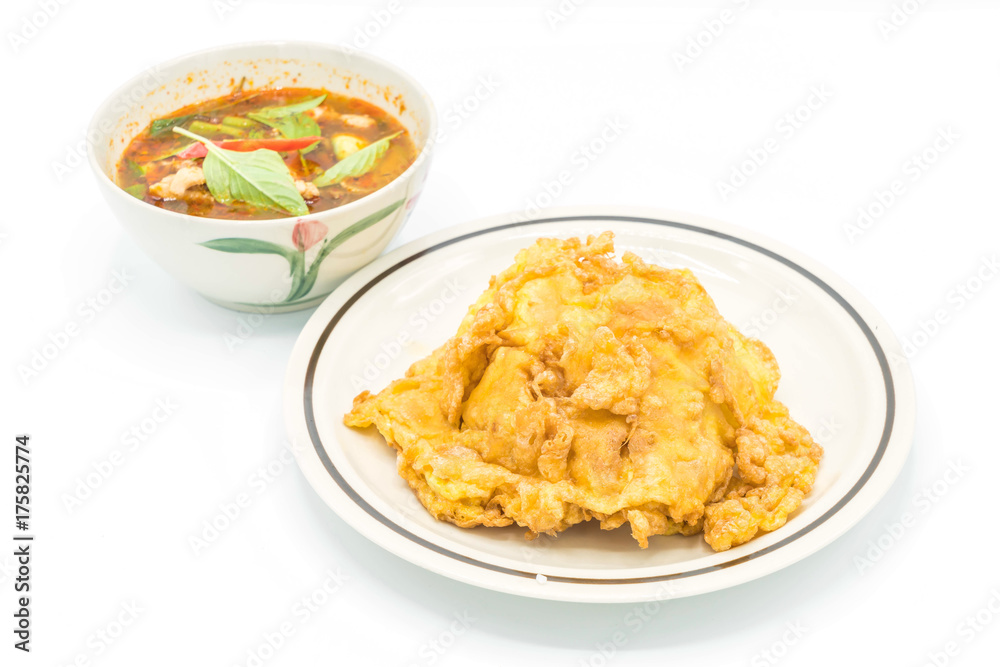 Thai spicy chicken soup  with omelet and rice