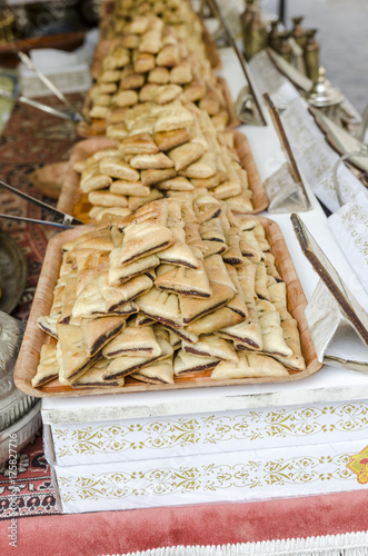 Arabic fresh sweets in a medieval market photo