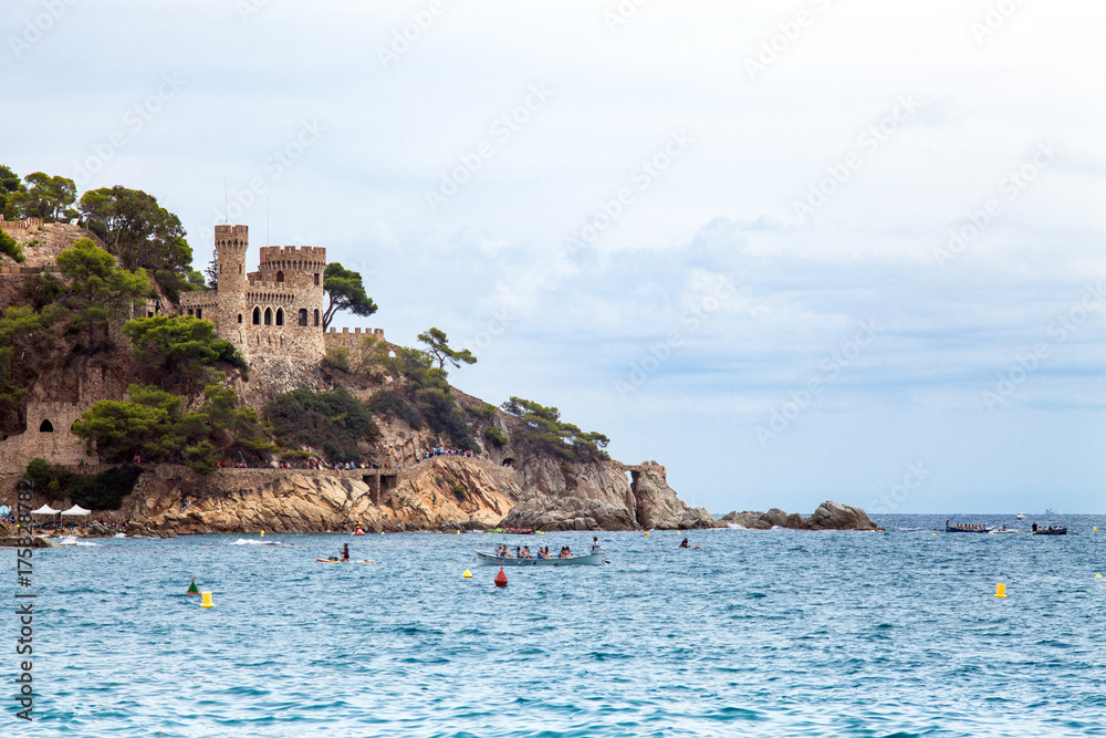 Castell d'en Plaja on the Costa Brava in Lloret de Mar, Spain. View of the Balearic Sea and the rocky coast. Popular tourist destination in Spain.