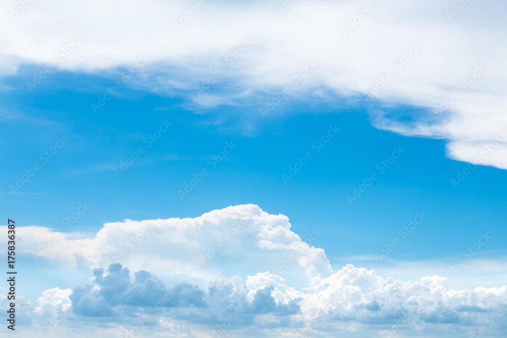 Blue cloudy sky on sunny day with copy space