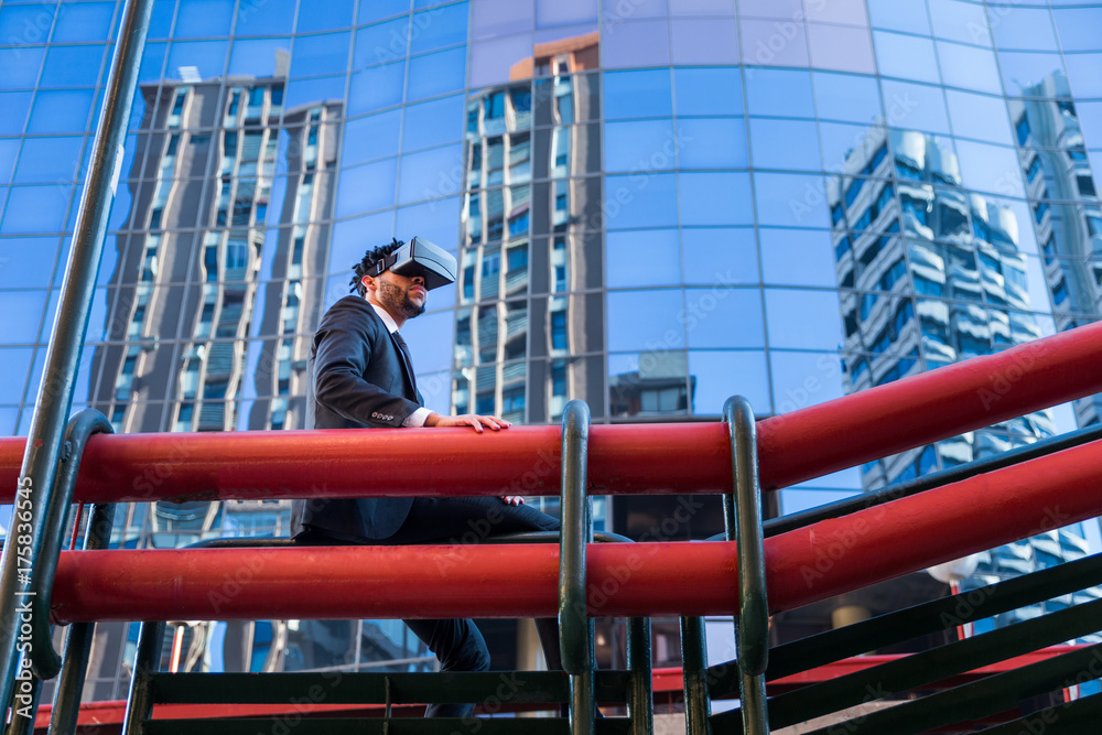 afro businessman playing virtual reality simulation afro businessman playing virtual reality simulation