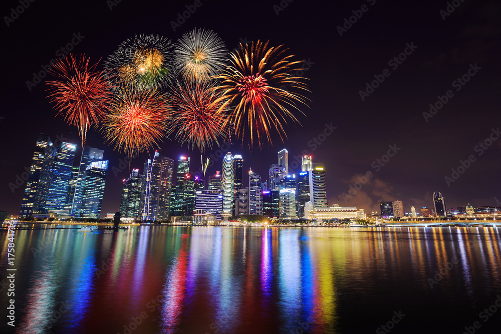 firework over central business district building of Singapore city at night firework over central business district building of Singapore city at night