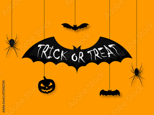Happy halloween. Trick or treat calligraphy on black bat. Hanging on ropes spiders and pumpkin. Banners party invitation.Vector illustration.