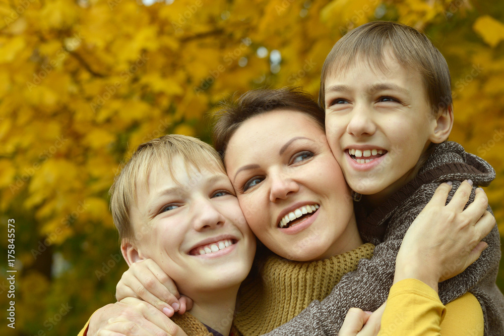 Fototapeta premium Mother and sons in park