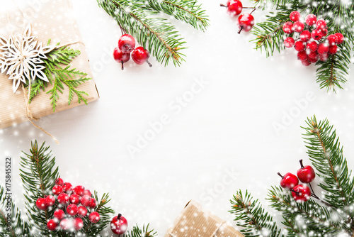 Christmas and New Year holiday background. Xmas greeting card. Snow effect. Flat lay