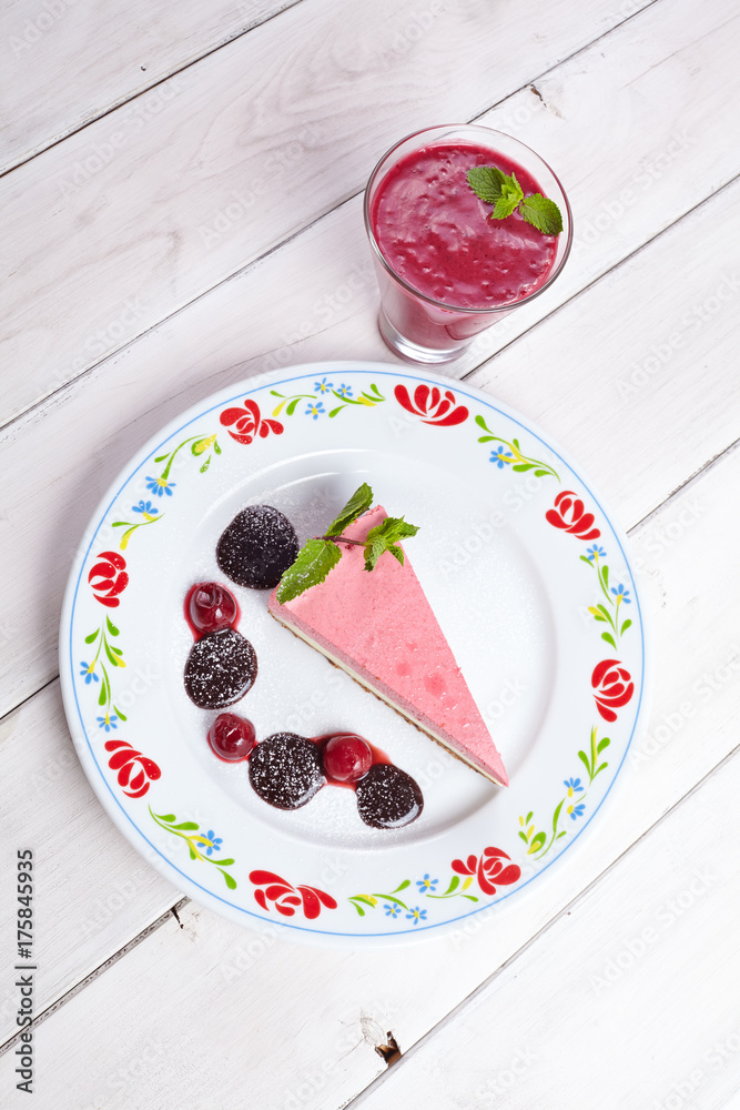 tasty cheesecake with smoothie