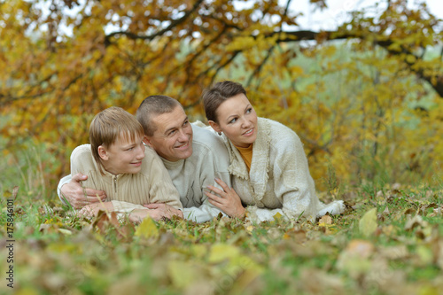 Happy family in the autumn park