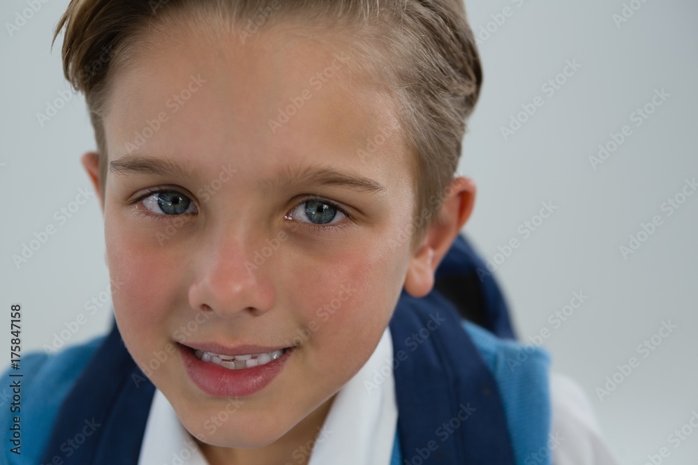 Smiling schoolboy looking at camera Smiling schoolboy looking at camera