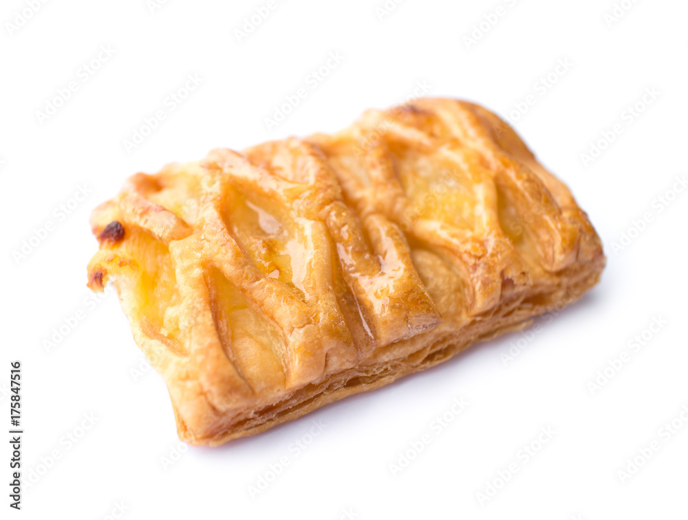 close up of crispy pineapple pie isolated on white background