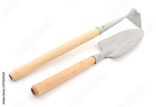 Garden shovel with a wooden handle.