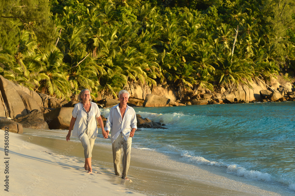 © aletia2011 - couple walking on  tropical beach