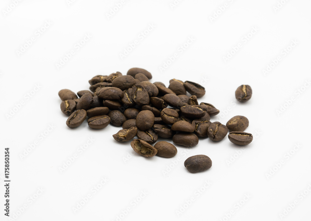 Isolated dark roasted coffee beans on white background Isolated dark roasted coffee beans on white background