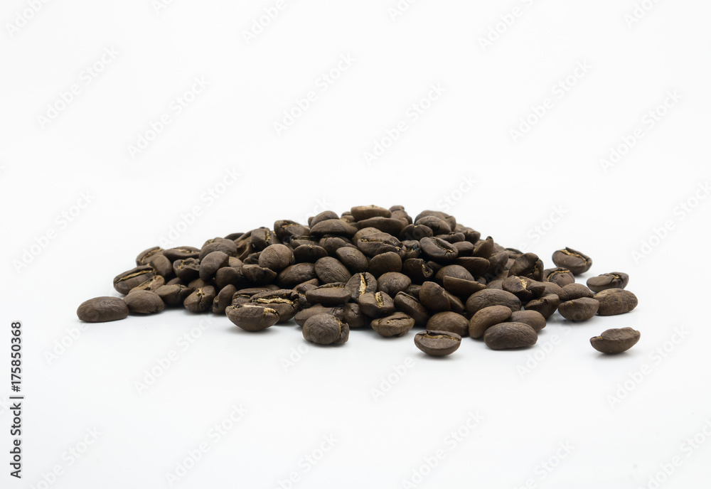 Isolated dark roasted coffee beans on white background Isolated dark roasted coffee beans on white background