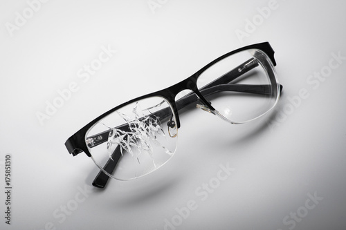 Fototapeta Naklejka Na Ścianę i Meble -  broken glasses on a white background