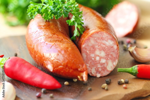 Smoked sausage with spices and greens