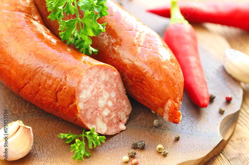 Smoked sausage with spices and greens