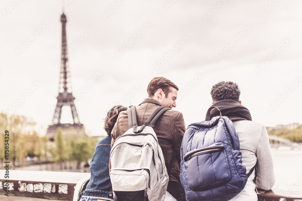 Fototapeta premium Multi-ethnic Group Of Friends Having Fun In Paris Along Seine