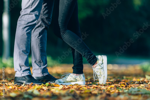Couple Man and Woman Feet in Love. Happy young family concept. Lifestyle with nature on background.
