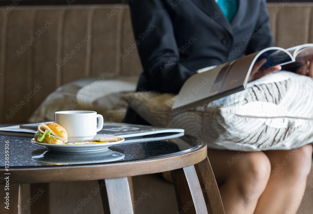 Delicious sanwich and coffee in dish on table Delicious sanwich and coffee in dish on table
